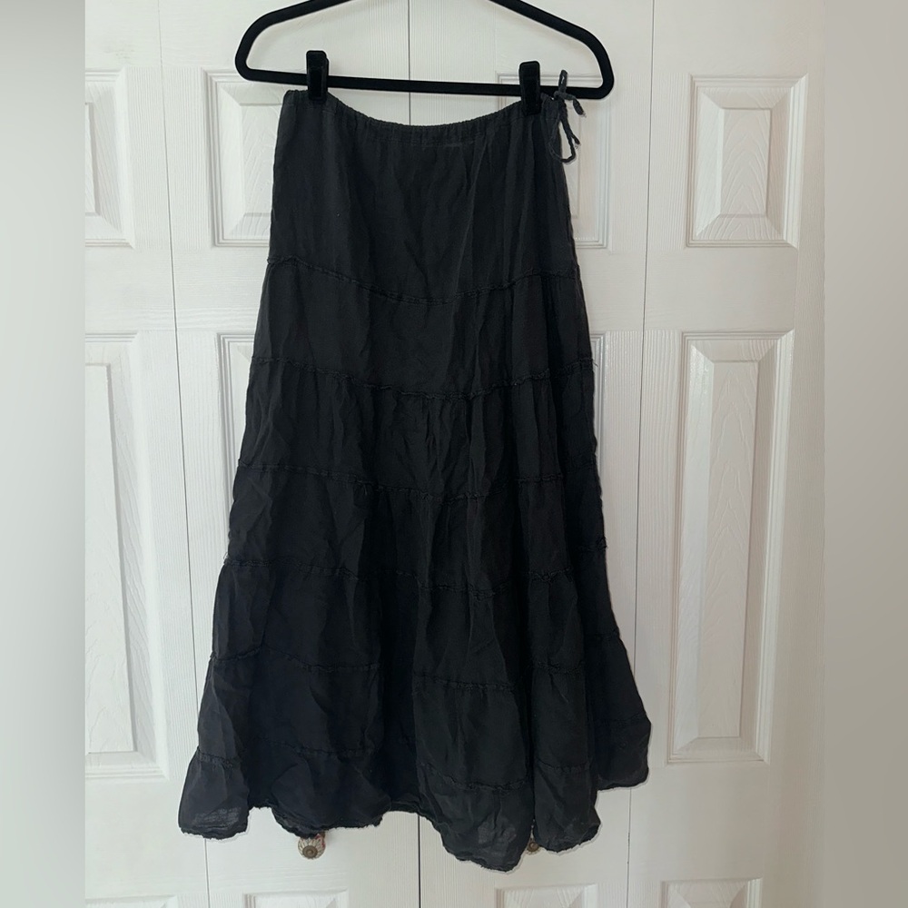 Light and flowing beach skirt with drawstring waist.